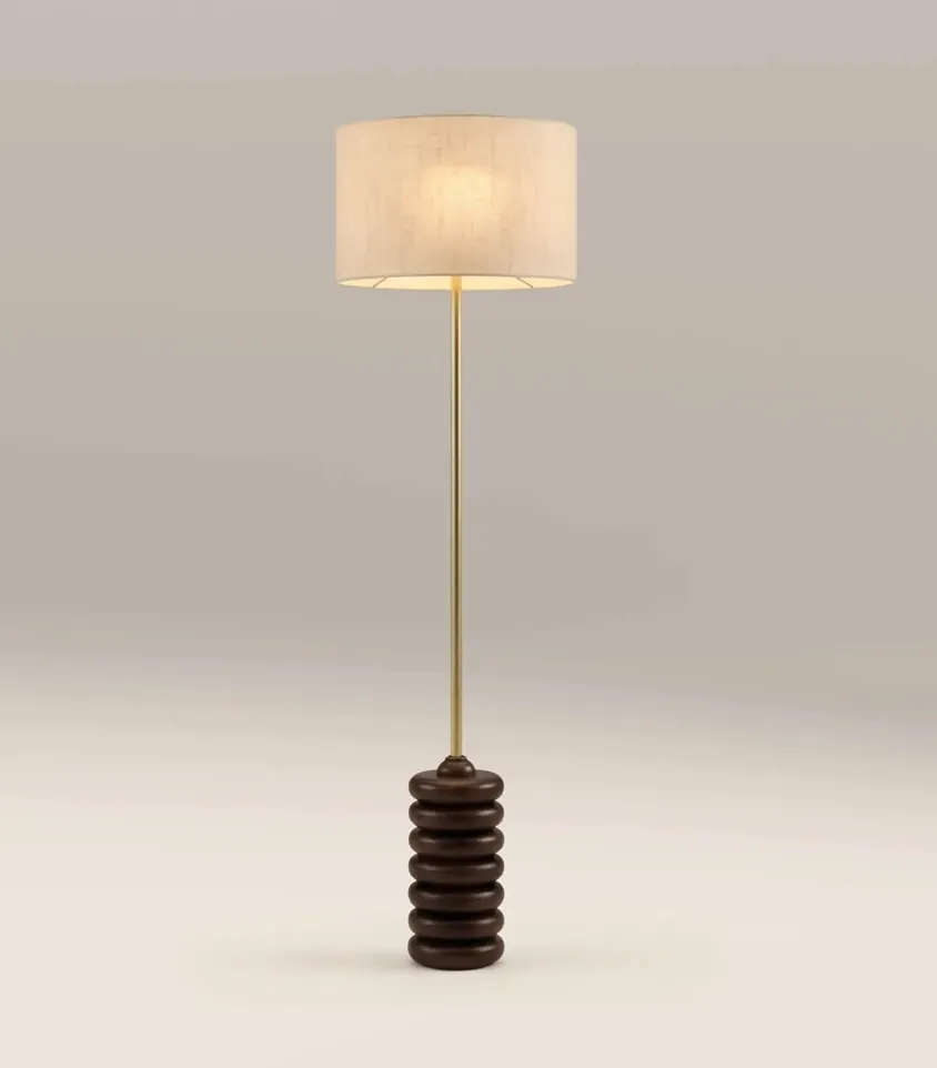 The Elodie floor lamp — a chunky linen shade on a walnut base