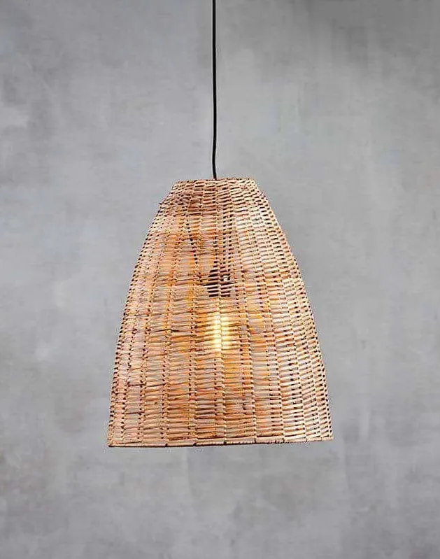 Nkuku Noko natural wicker conical pendant throwing a patterned shadow