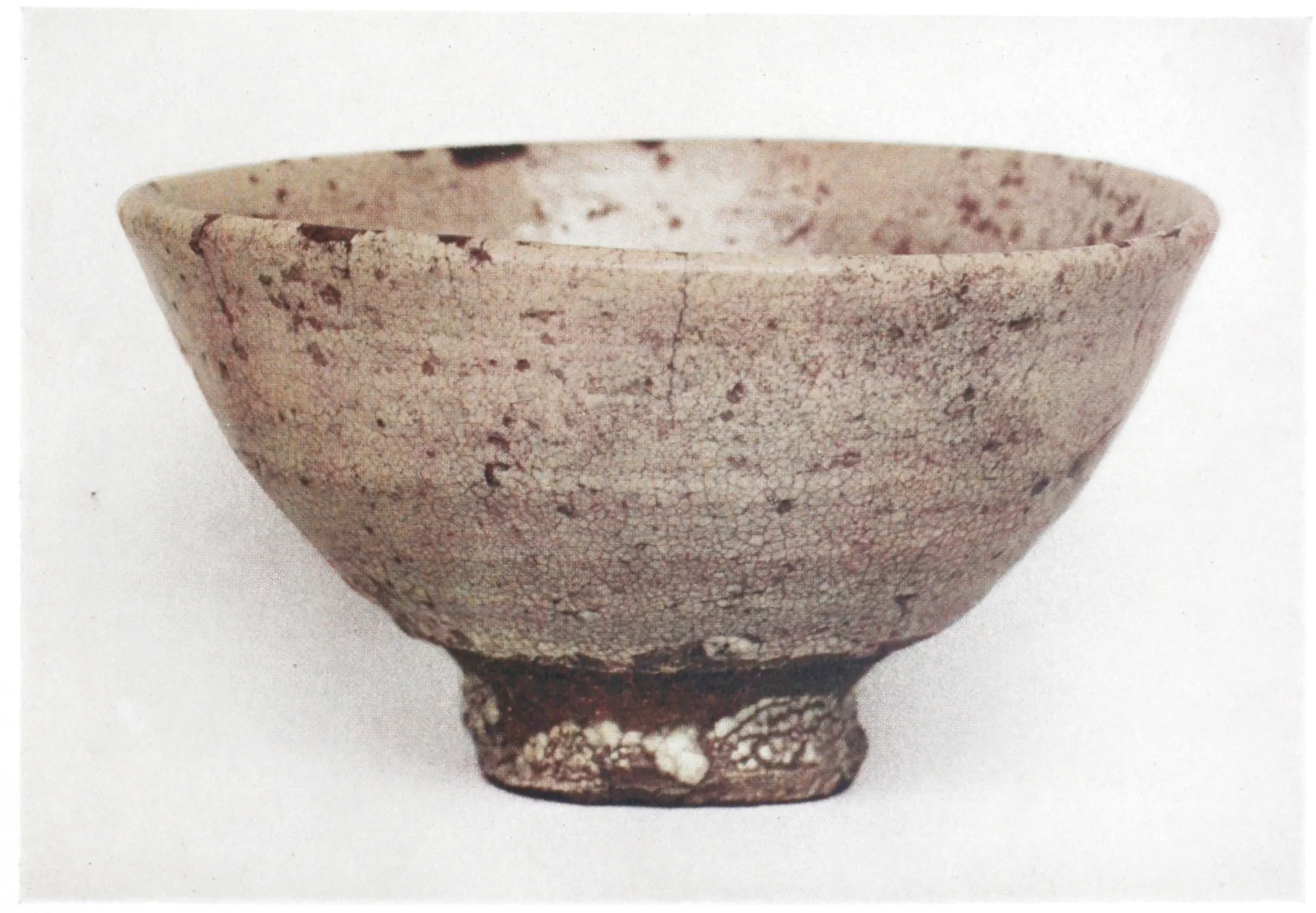 A plain, undecorated sixteenth-century Korean rice bowl of the Ido type, the form prized in the Japanese tea ceremony.